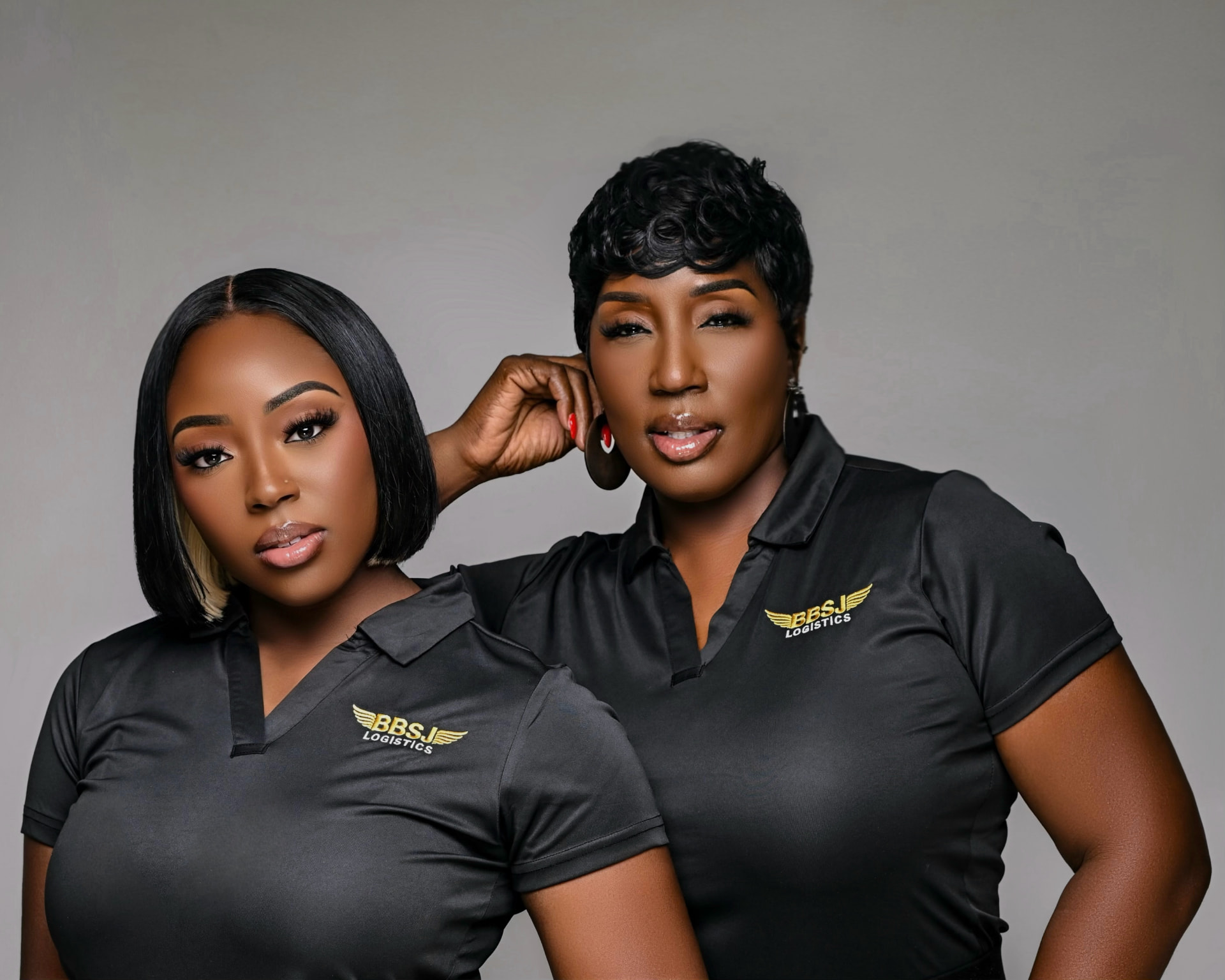 Tijema Brown and Tiawana Brown in BBSJ Logistics polos